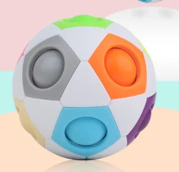 7cm diameter rainbow coloured ball puzzle with visible holes and internal movable balls