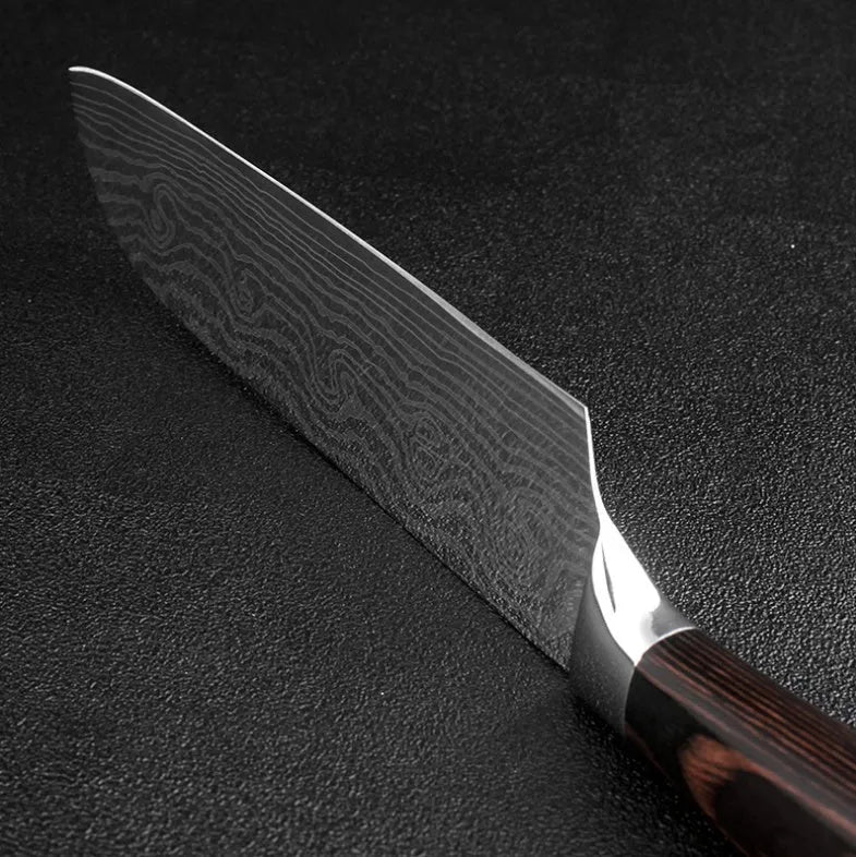 Kitchen knife set with Damascus pattern blades and coloured wood handles on display