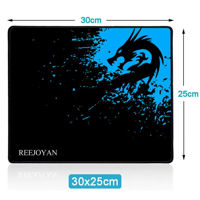 Non-slip mouse pad with textured surface and reinforced stitched edges on a desk