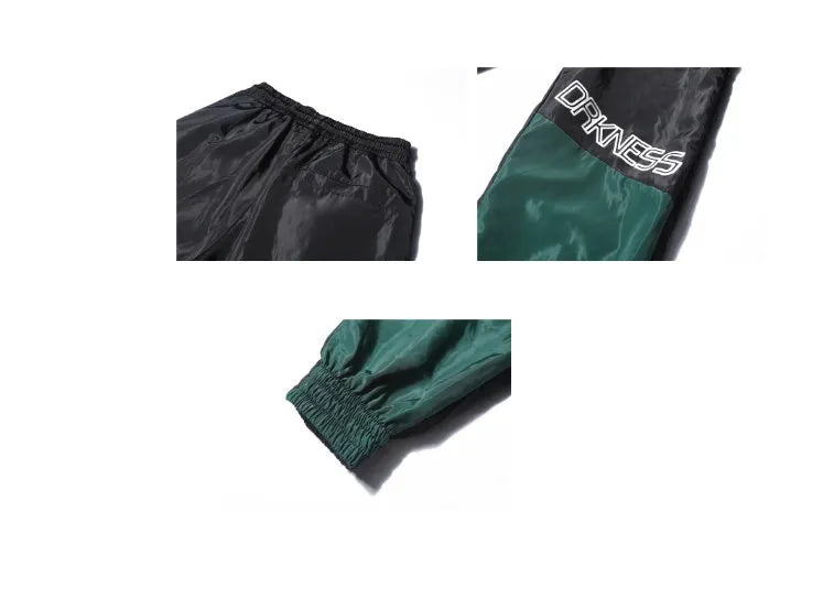 Green Japanese hip hop sweatpants with hit colour stitching, letter print, and bouquet floral design on a low-waist drawstring style