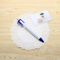 Orange multifunction pen with vernier caliper and 0.5mm ballpoint tip measuring 15cm long