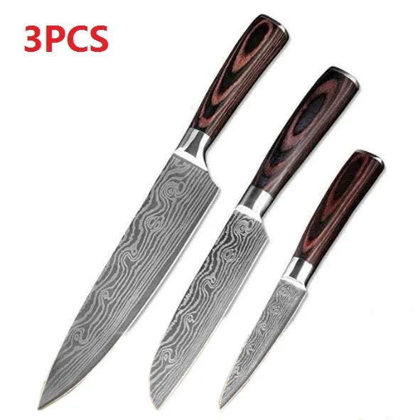 Kitchen knife set with Damascus pattern blades and coloured wood handles on display