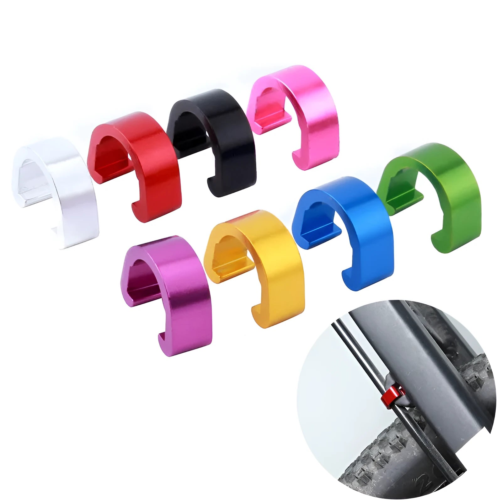 Set of ten small aluminium alloy C-shaped buckles in assorted colours on a white background.