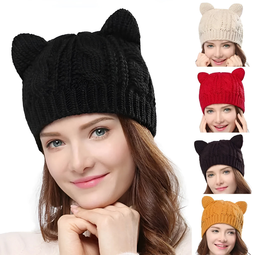 Hand-made red knitted winter beanie with 3D cat ears on a mannequin head.