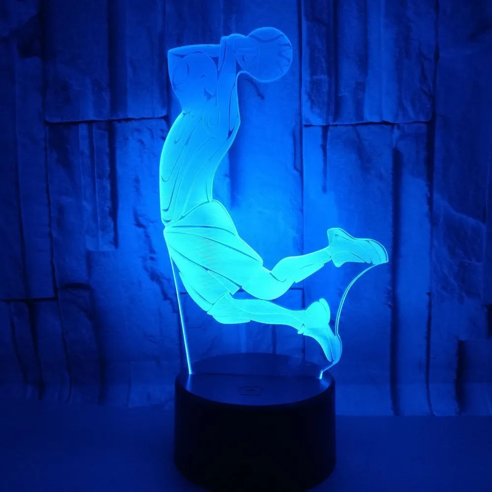 Shooting 3D night light in black with remote control showing seven colour options including red, green, blue
