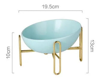 Ceramic pet bowl in blue with non-slip shelf, size M 600ml, on a wooden floor