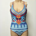Women's one-piece swimsuit with open back and floral pattern in polyester spandex blend