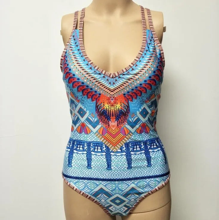 Women's one-piece swimsuit with open back and floral pattern in polyester spandex blend