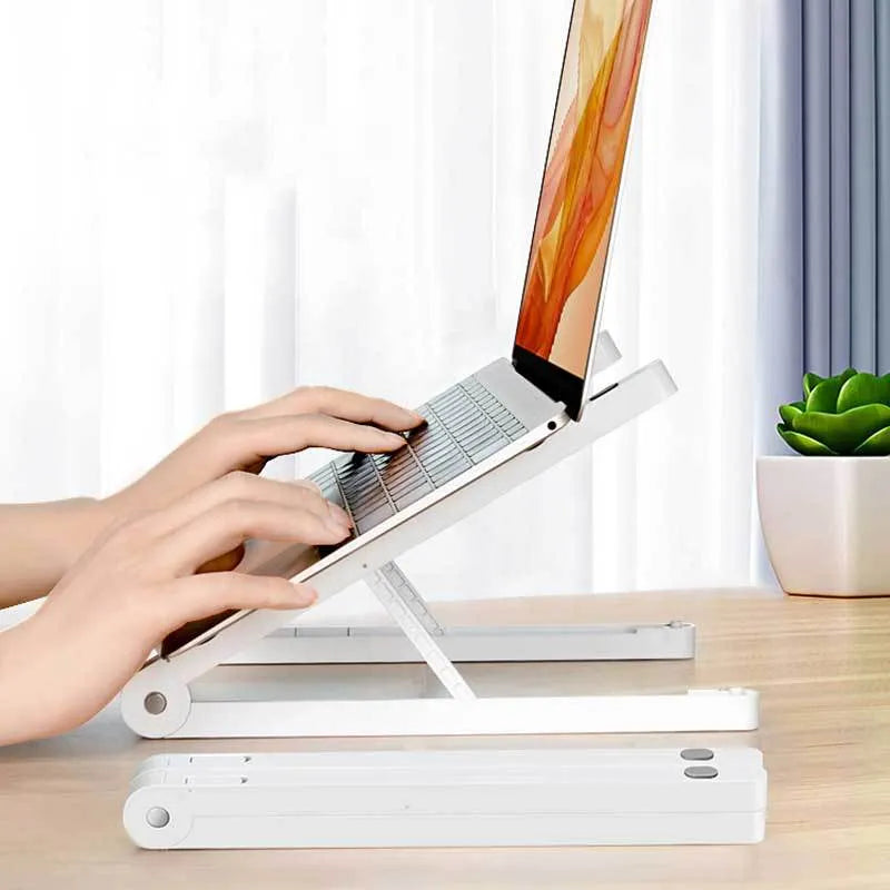 Folding plastic laptop stand in black or white, 275mm x 32mm x 30mm desktop riser for a laptop.