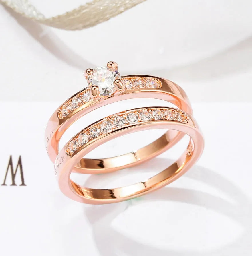 Rose gold ring with diamonds on a copper band, available in US sizes 5 to 12