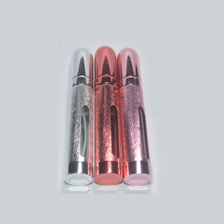 12ml aluminium travel perfume bottle with glass liner in silver finish, showing slim 115mm design.