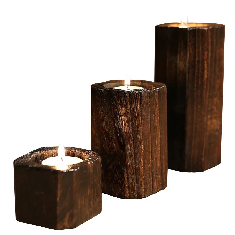 Three solid wood candle holders in natural paulownia wood charcoal-fired finish sizes small medium large