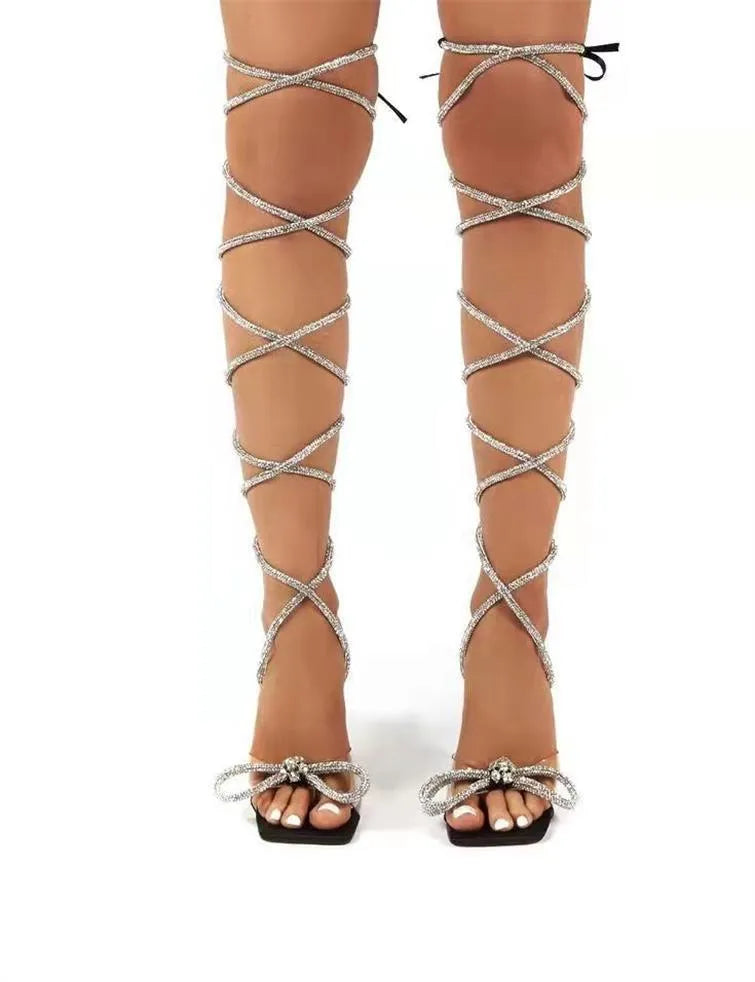 Plus size women's high-heel sandals with rhinestone straps in black, beige, and colourful colours.