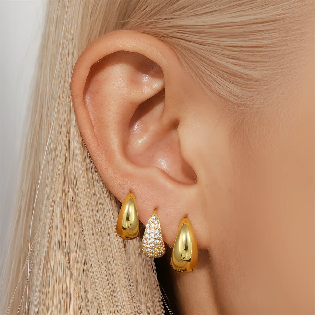 Brass diamond earclip earrings with geometric round design and gold electroplated finish
