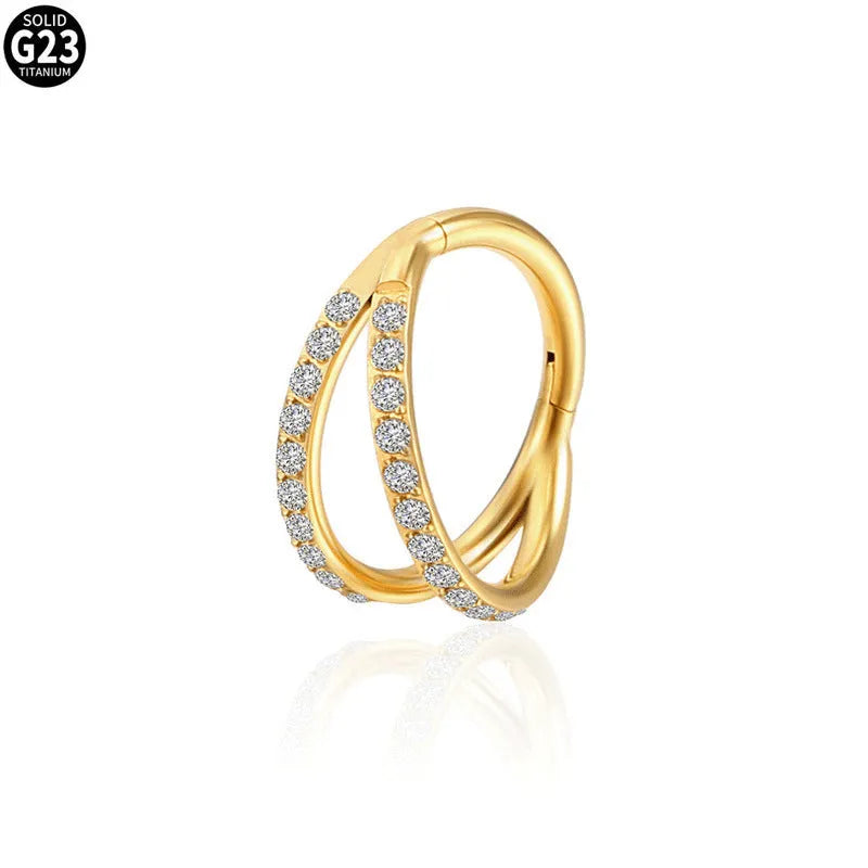 G23 titanium alloy nose ring with zircon detail in gold and steel colours, showing 1.0mm and 1.2mm diameter options.
