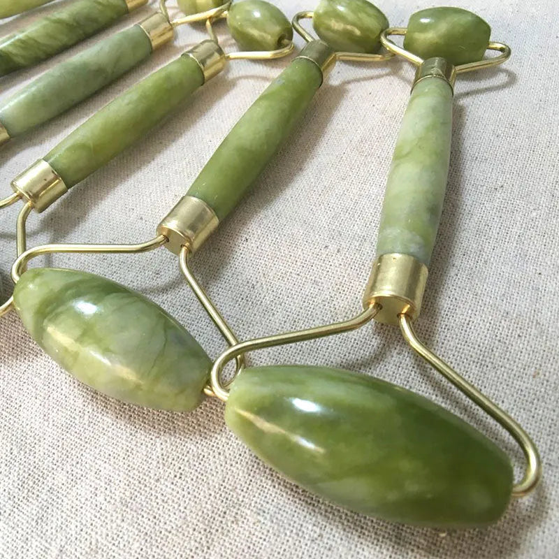 Double-end jade roller with natural Xiuyu jade, 14cm total length, 4.5cm large wheel and 2.2cm small wheel, green colour