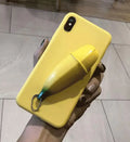 Banana yellow silicone iPhone case with unzip design detail showing anti-slip texture