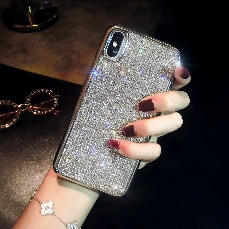 Silver silicone iPhone case with full diamond crystal decoration showing front and back views
