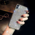 Silver silicone iPhone case with full diamond crystal decoration showing front and back views