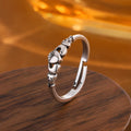 Retro silver copper open ring for women featuring a detailed heart shape design on an adjustable band.