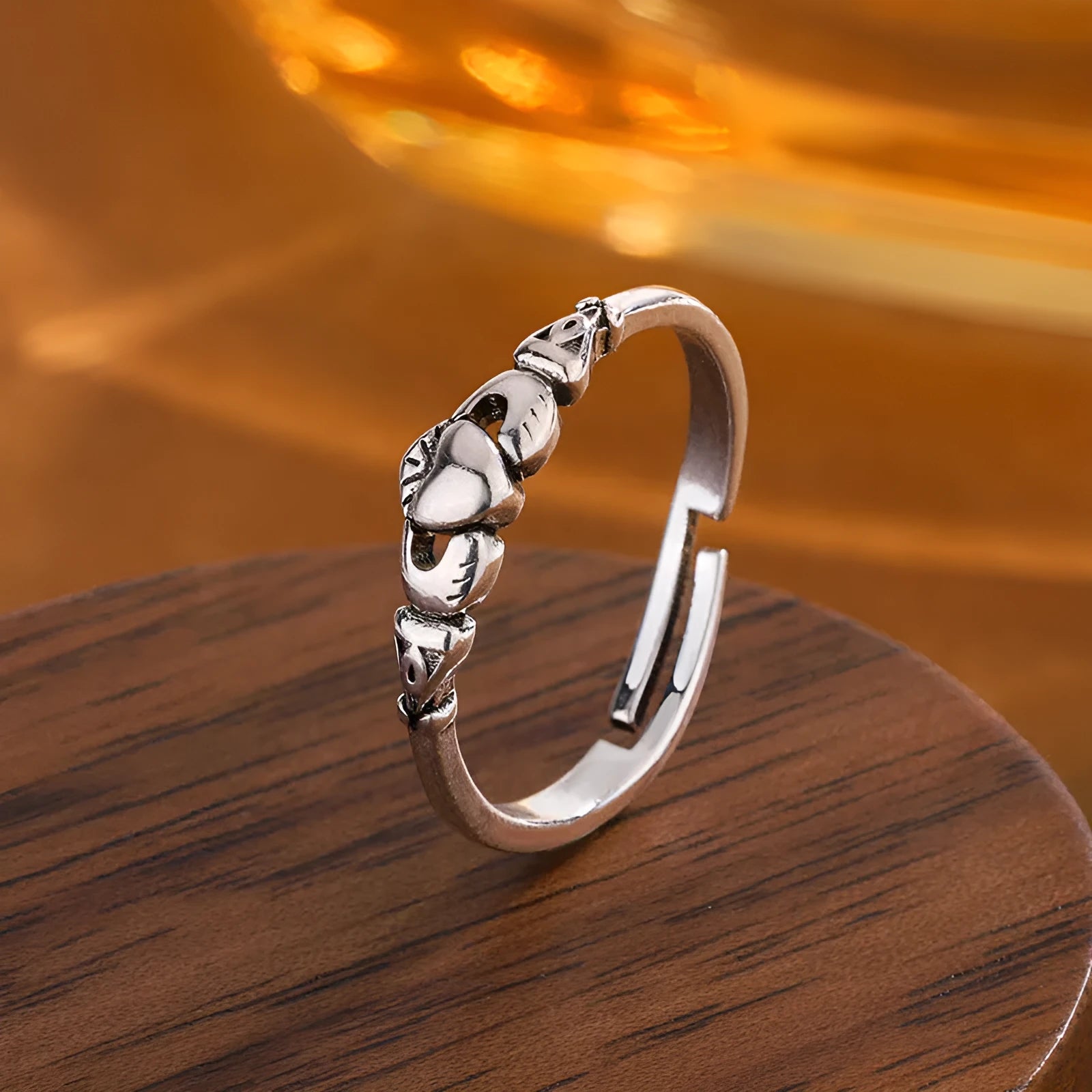 Retro silver copper open ring for women featuring a detailed heart shape design on an adjustable band.
