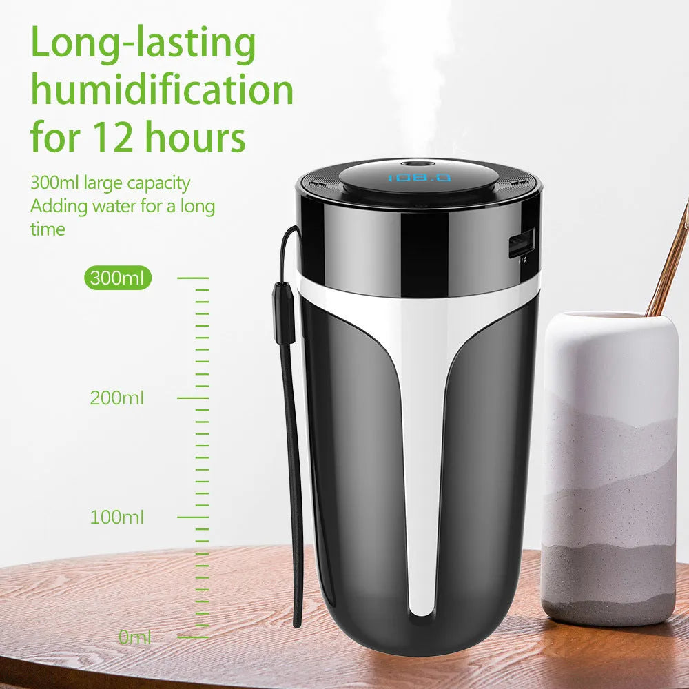 Black multifunctional air purifier 73x73x152mm on desk with USB cable