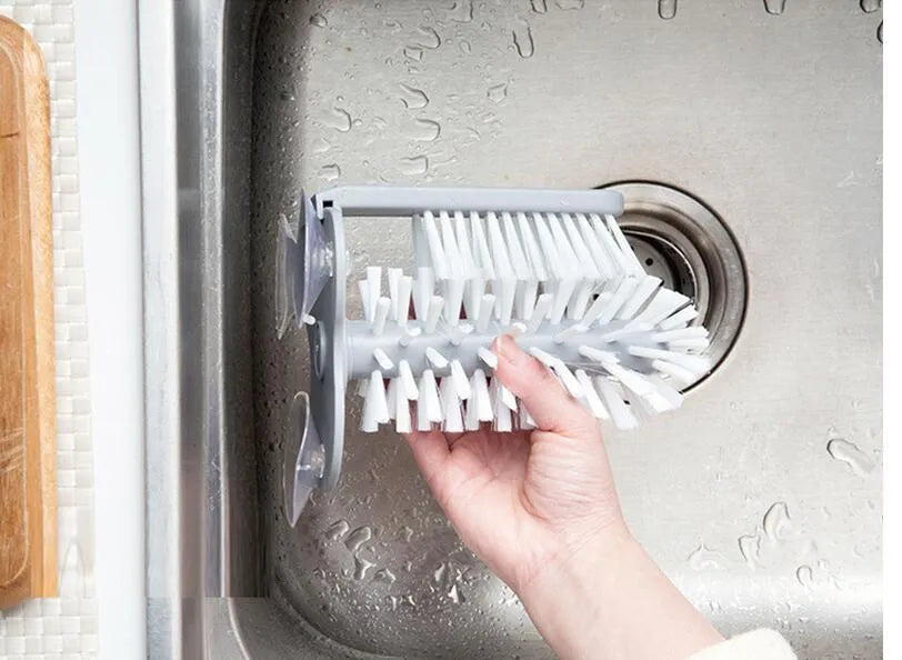 Grey double-head rotating cup brush with suction cups for wall mounting