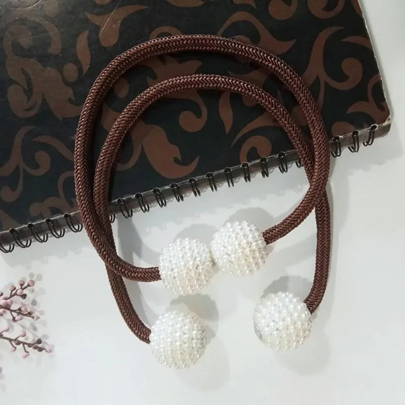 Magnetic curtain tiebacks with pearl beads in multiple colour options on white background