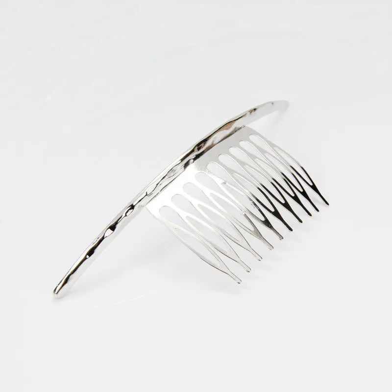 Curved alloy hair comb in gold and silver, 11cm long and 4cm wide, lightweight styling tool