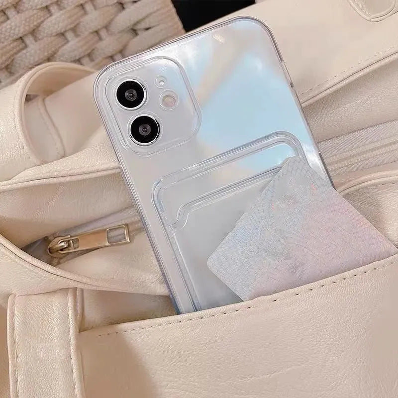 Transparent phone case with card slot for Apple iPhone on a table.