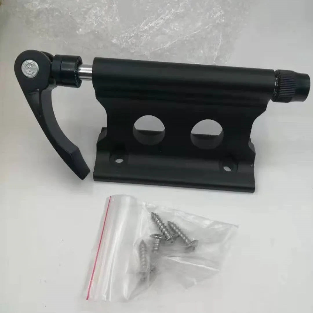 Silver metal quick release fixing clip for bicycle front fork on a white background
