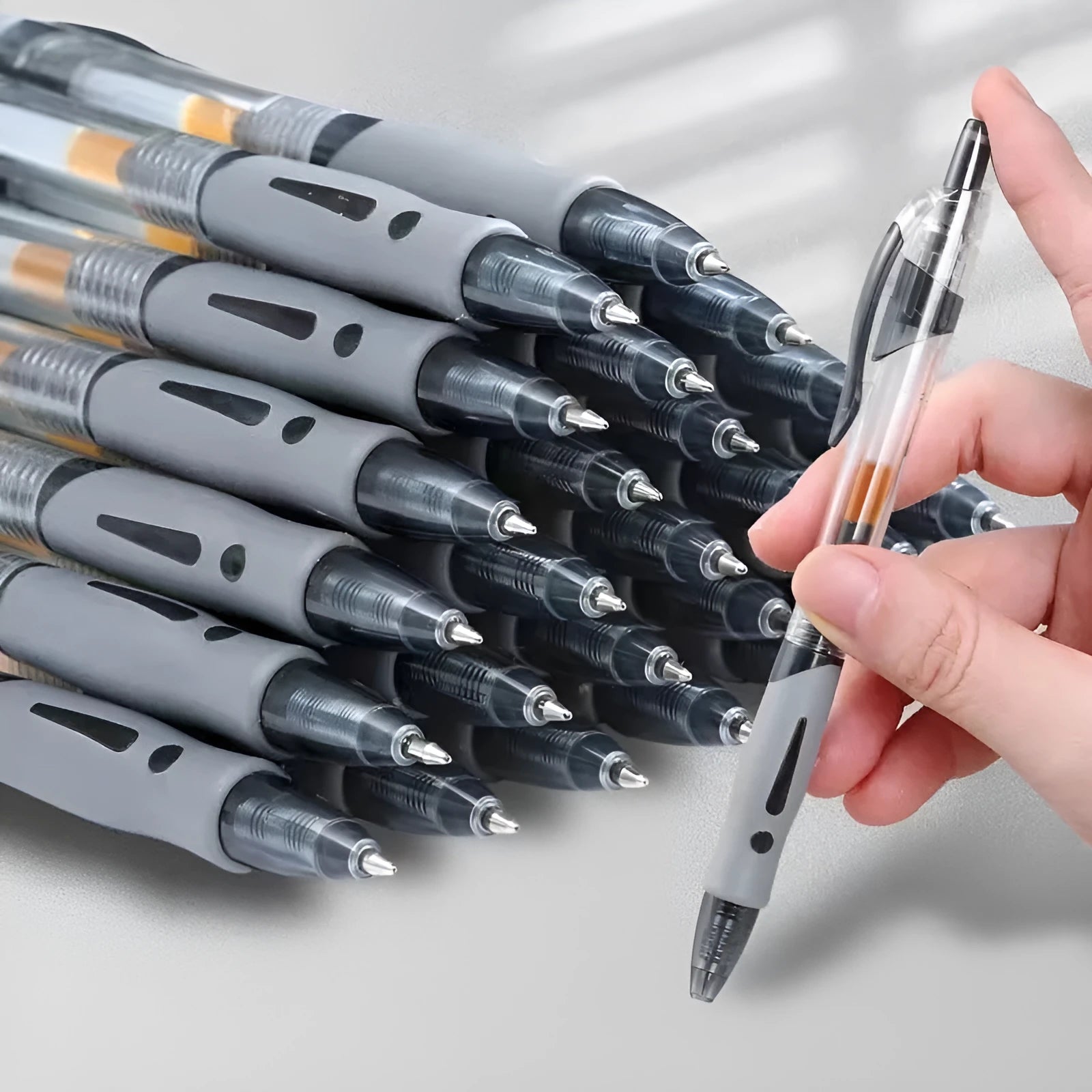 A plastic gel pen with a 0.5mm tip, shown in black, red, and blue colour options.