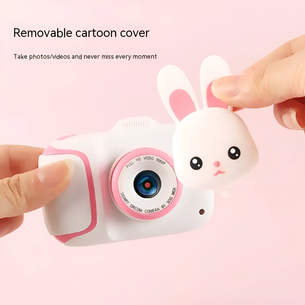 HD children's camera with 2.0 inch LCD screen in pink, showing video mode, with data cable and manual