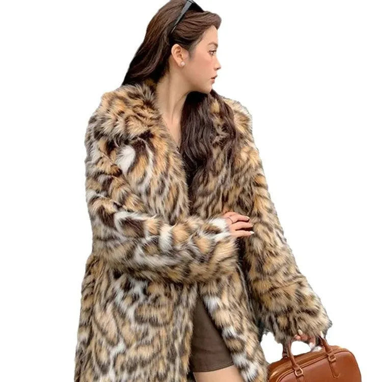 Artificial fox fur coat with fur collar in street fashion style with pockets