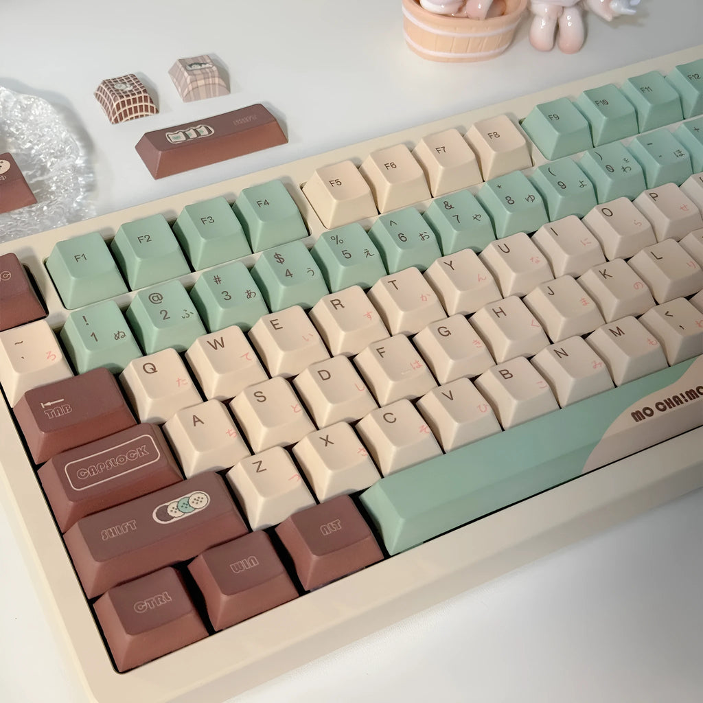 Matcha green mechanical keyboard key caps with cross-shaped satellite shaft design