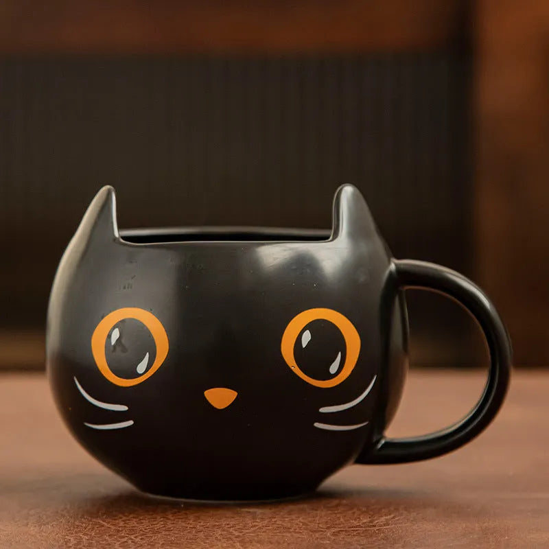 Black ceramic mug with cat-shaped pumpkin lid and spoon, 355ml capacity