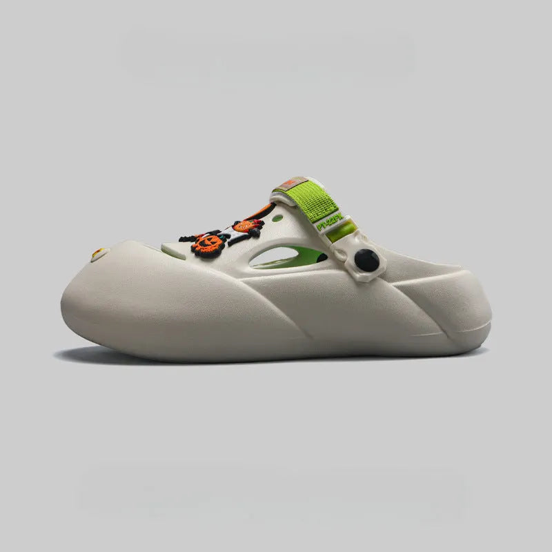 Men's grey baotou beach shoes with hole design and lightweight EVA sole on a sandy background.