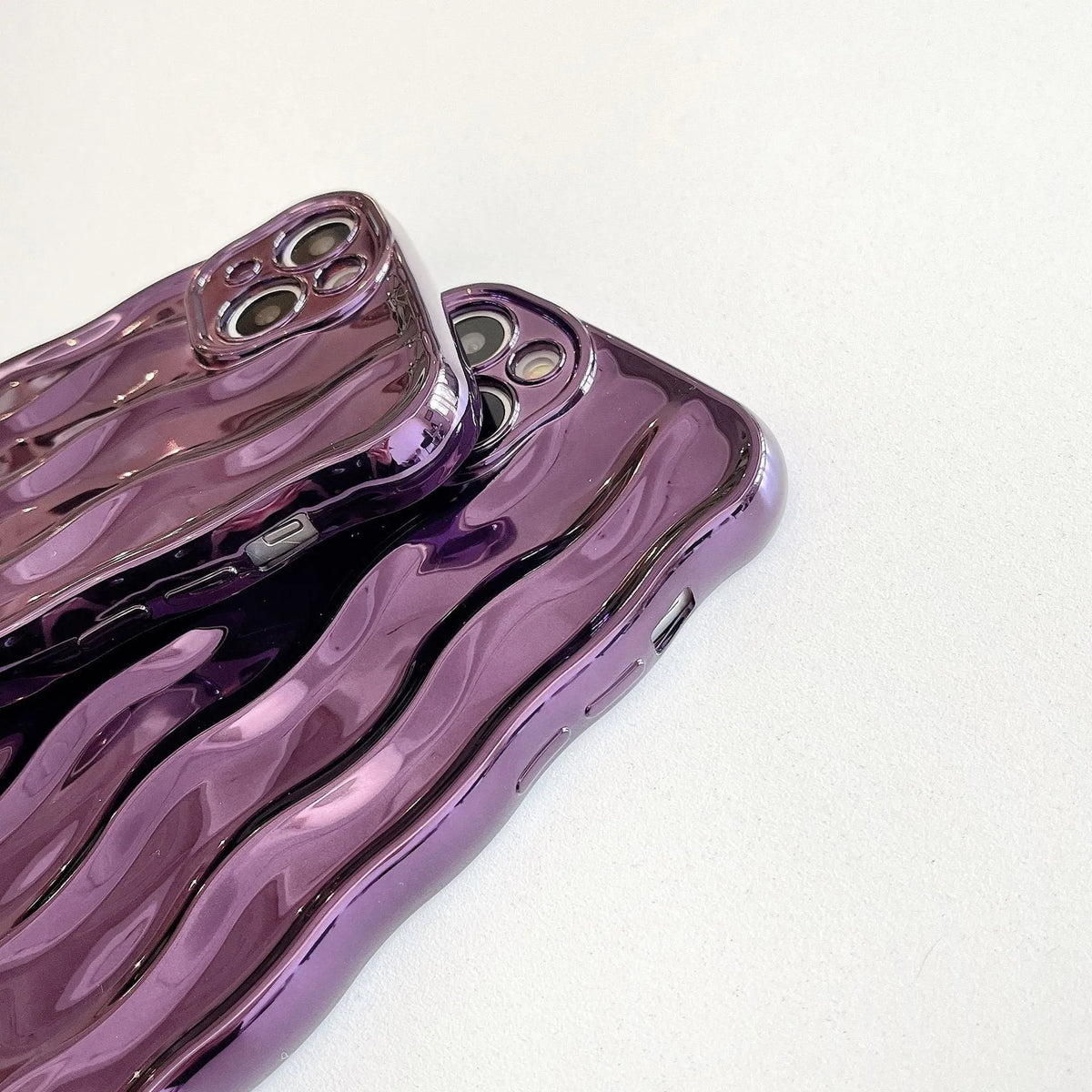Electroplated water ripple iPhone case in silver with anti-fall TPU construction for iPhone 11-14 models.