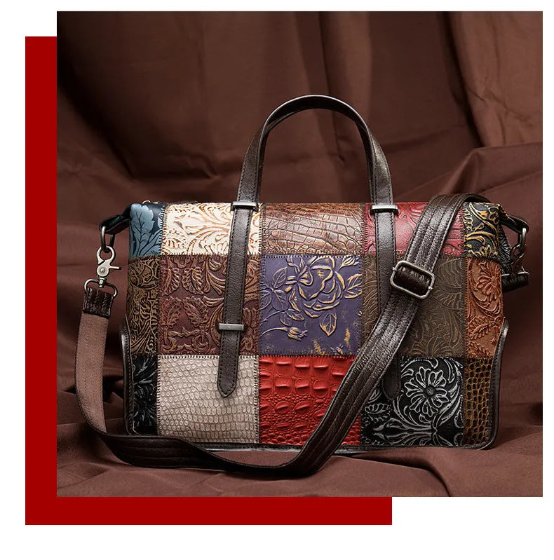 Cowhide leather women's handbag in multi-colour, 36cm long with zip closure and shoulder straps.