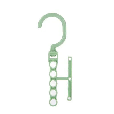 Blue revolving wardrobe hanger with five holes and handle for organising multiple garments