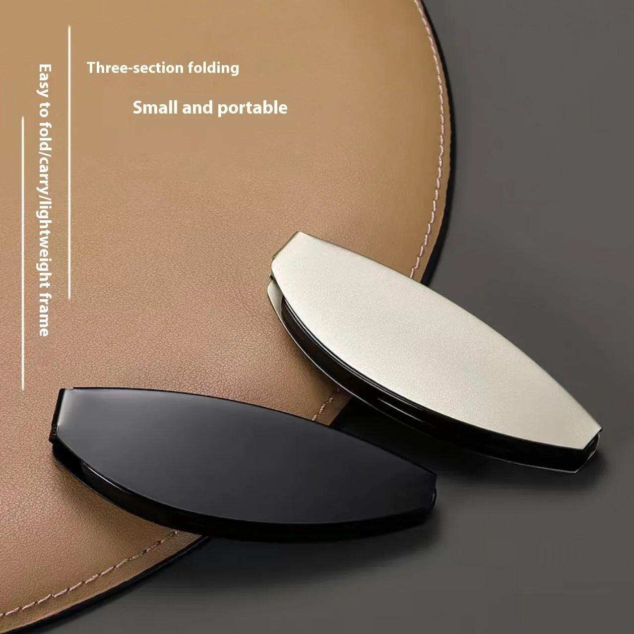 Black folding presbyopic glasses with metal frame and ring detailing shown open and folded