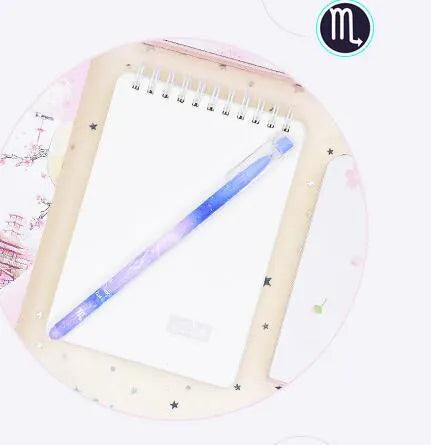 Box containing twelve constellation themed quick-drying gel pens for office use