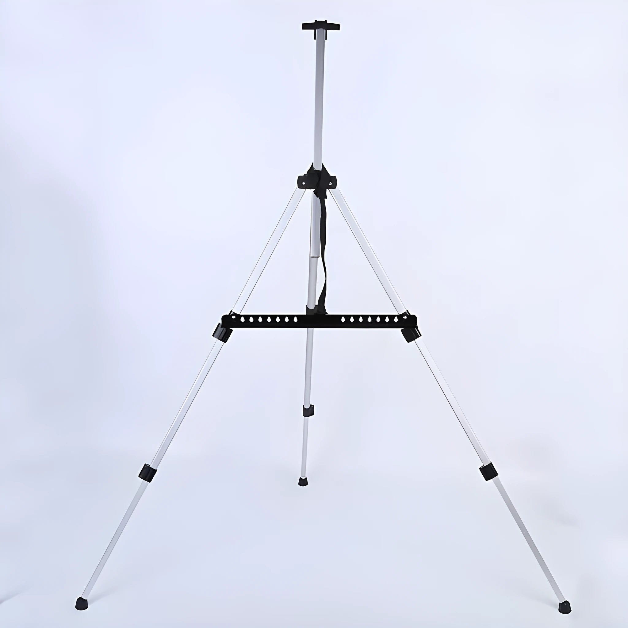Silver aluminium alloy adjustable easel with metal tray, collapsed for table top use, next to a black nylon carrying bag