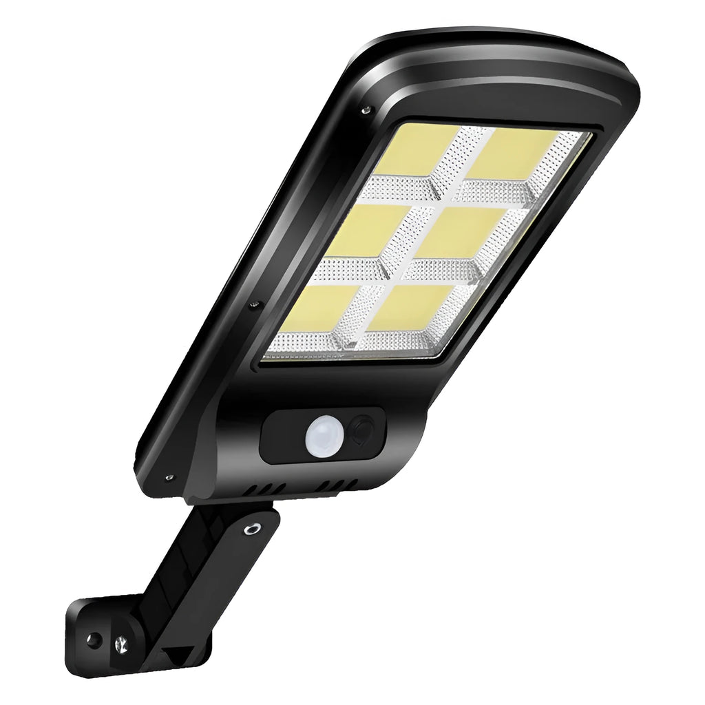 Black solar-powered outdoor security light with motion sensor on a wall