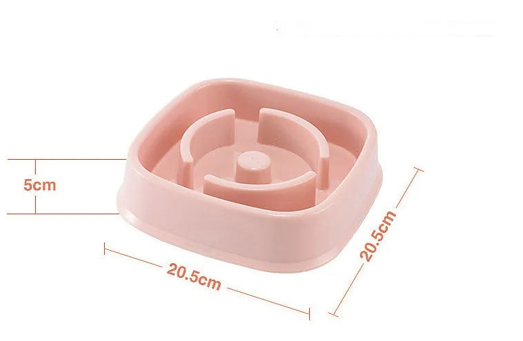 Plastic slow food bowl for dogs and cats with flower-shaped internal obstacles, pink colour, choke prevention design.