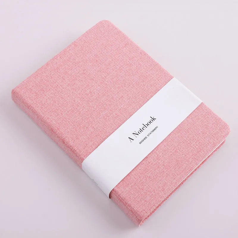 Wire bound notebook with blue cloth cover, 132 lined and blank pages, small size 10.5 x 14.5 cm