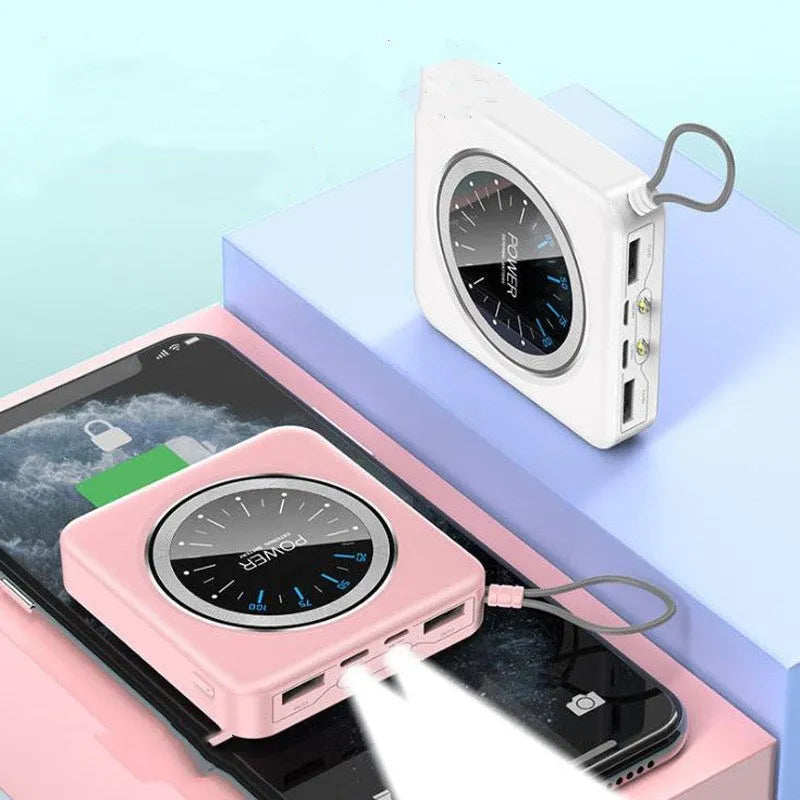 Compact mint green alloy power bank with a digital LCD display showing battery percentage, next to a smartphone.