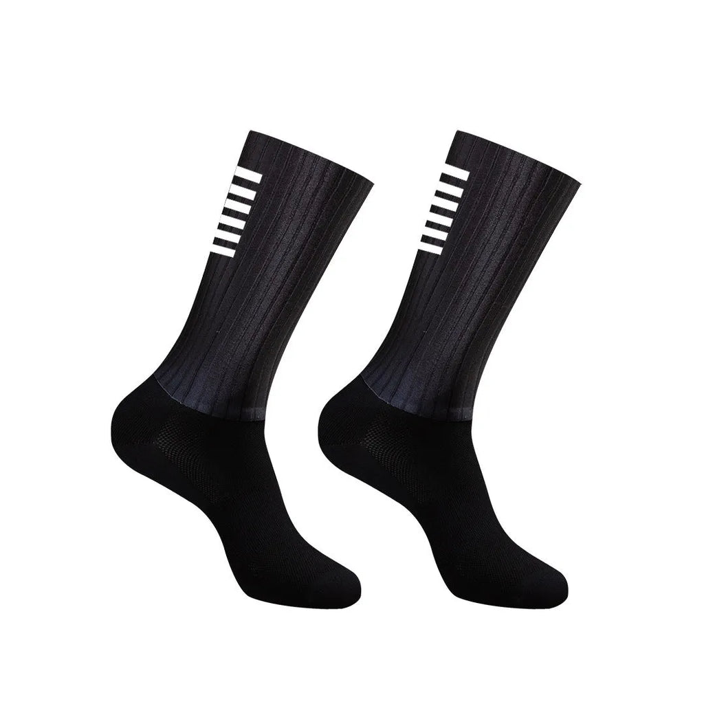 Pair of breathable athletic sports socks for cycling and running in a chemical fibre blend fabric.