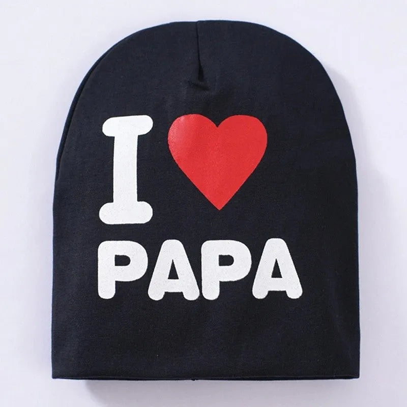 Baby beanie in cotton and Lycra blend for winter, shown in grey with a Love Mama heart print.