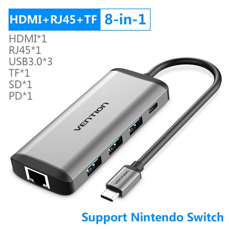 Deep grey aluminium alloy USB-C to HDMI, USB 3.0, Ethernet, and card reader hub converter with 0.15m cable.
